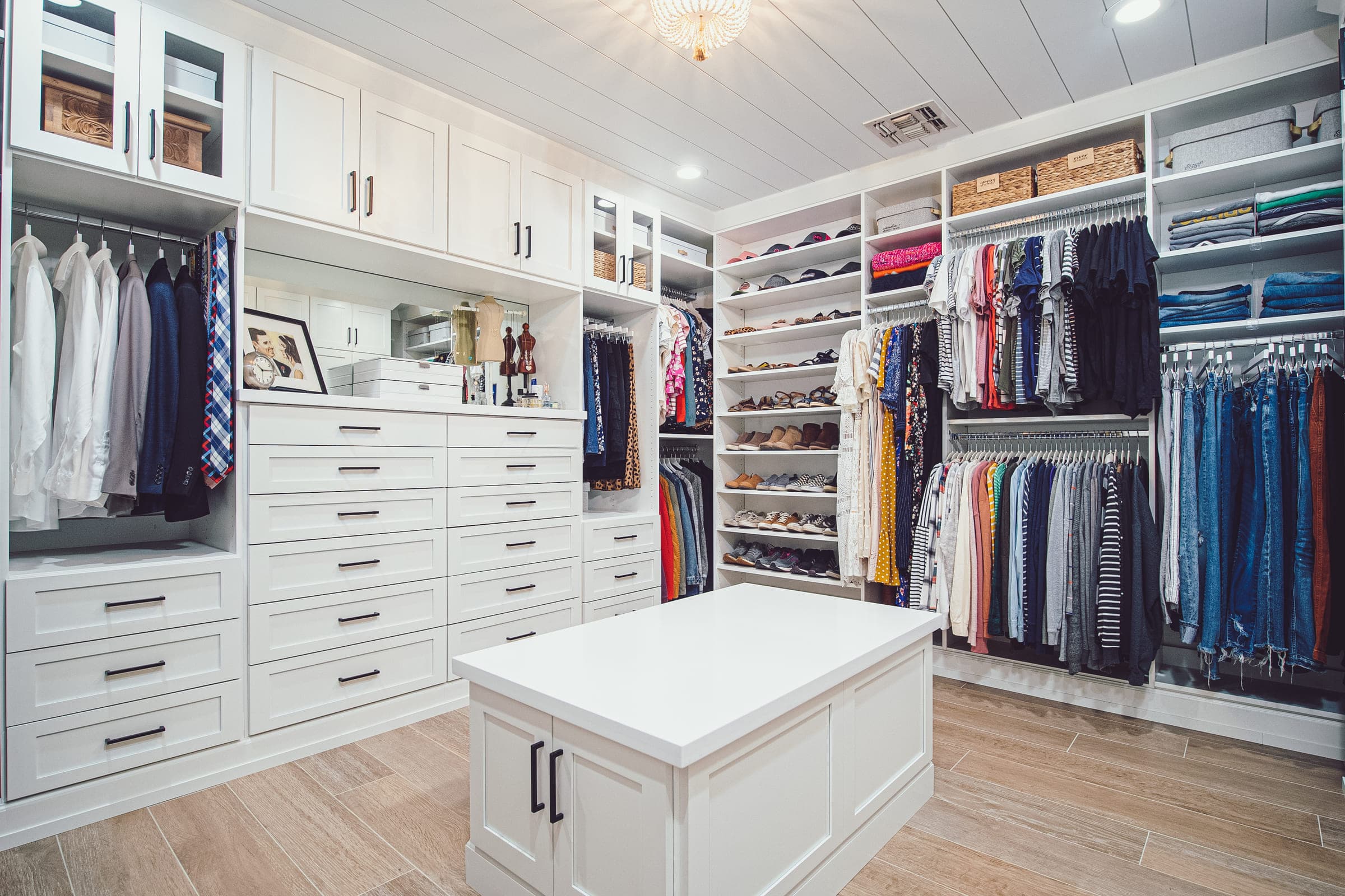 A completed Classy Closets custom walk-in closet in a San Diego home